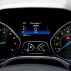 Close-up view of a Ford Focus dashboard showing the speedometer and various gauges.