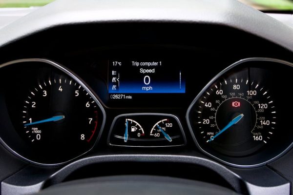 Close-up view of a Ford Focus dashboard showing the speedometer and various gauges.