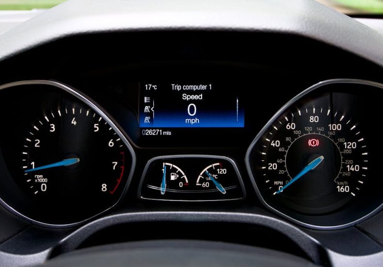 Close-up view of a Ford Focus dashboard showing the speedometer and various gauges.